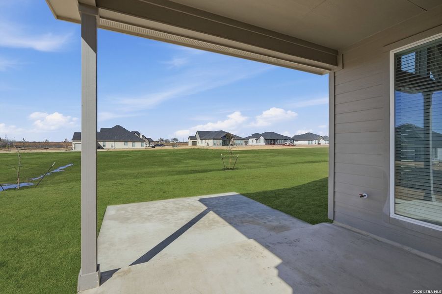 Exterior details and patio area of a home in Sienna Lakes, San Antonio (Image 24).