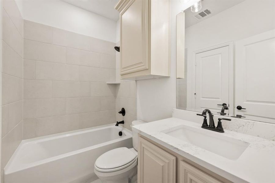 Furnished interior view inside a new home in Villages of Hurricane Creek, Anna (Image 9).