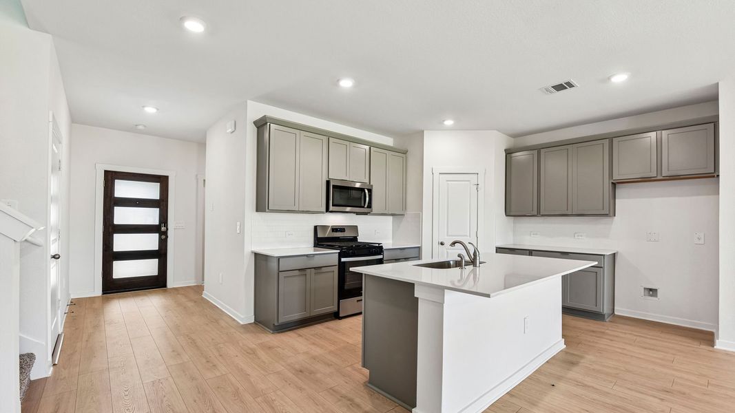 Furnished interior view inside a new home in Monarch Ranch, Manor (Image 8).