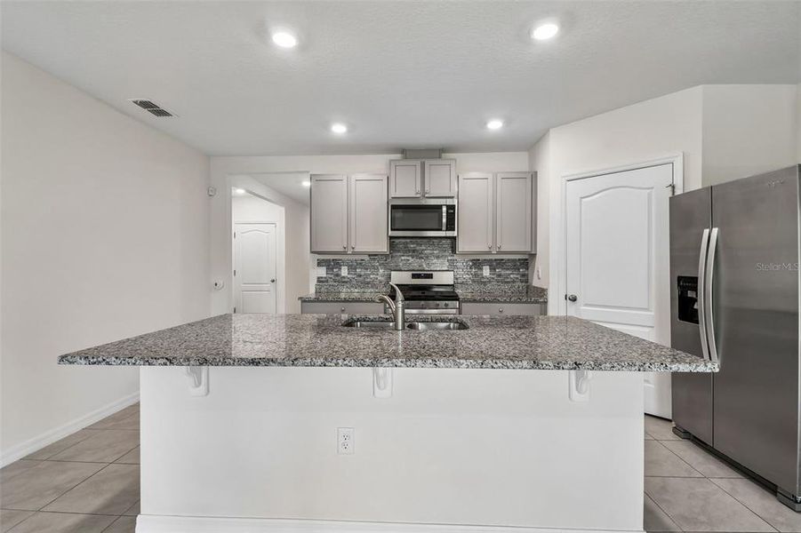 Furnished interior view inside a new home in Riviera Bella, Debary (Image 12).