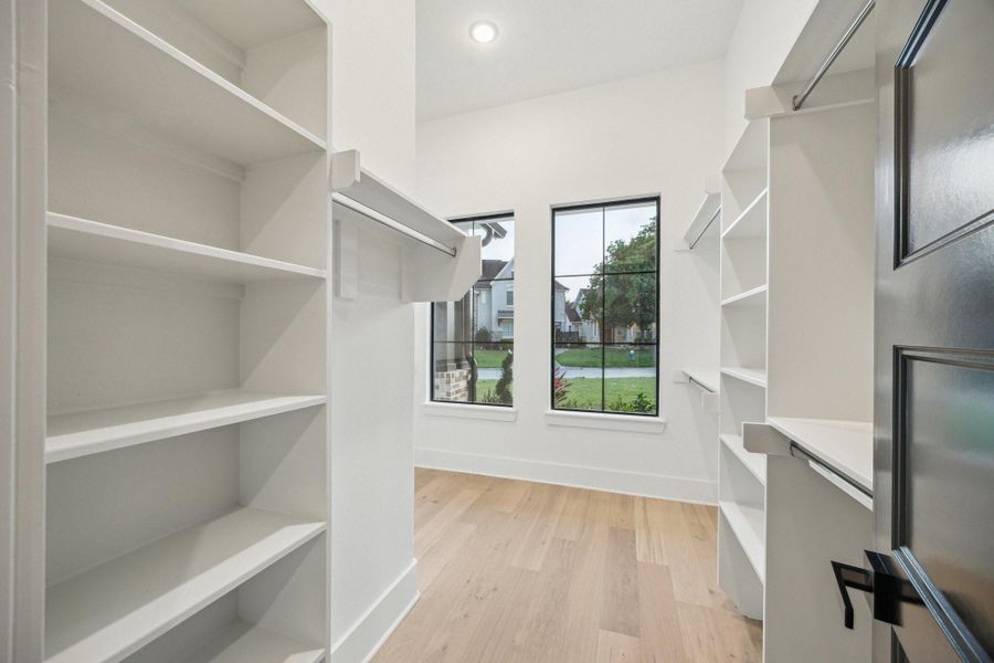 Massive guest suite closet with windows Massive guest suite closet with windows