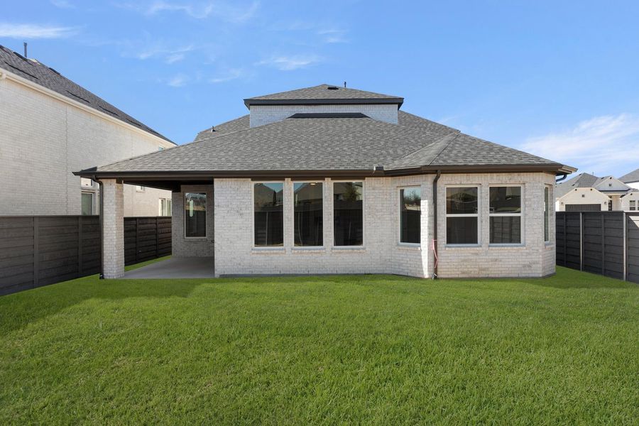 Exterior details and patio area of a home in Union Park, Little Elm (Image 16). Exterior details and patio area of a home in Union Park, Little Elm (Image 16).