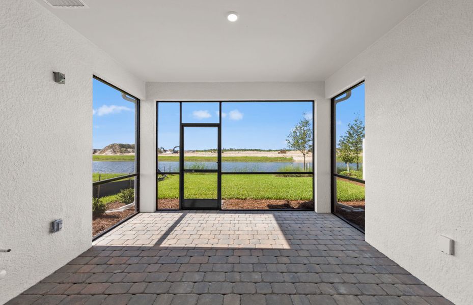 Exterior details and patio area of a home in TerraWalk at Babcock Ranch, Alva (Image 2). Exterior details and patio area of a home in TerraWalk at Babcock Ranch, Alva (Image 2).