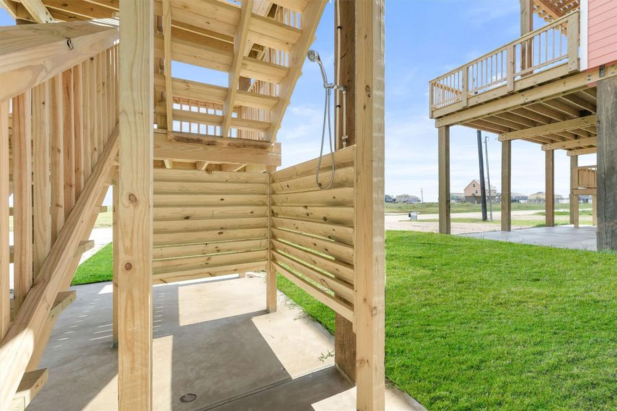 Enclosed outdoor shower for rinsing off after a day at the beach. Enclosed outdoor shower for rinsing off after a day at the beach.