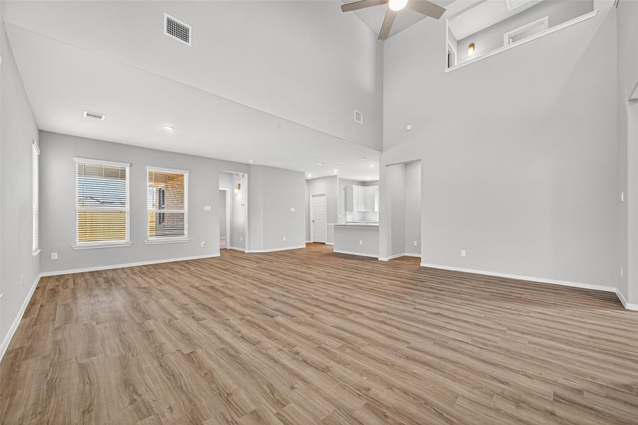 Spacious, unfurnished interior of a new home in Sunterra, Katy (Image 31).