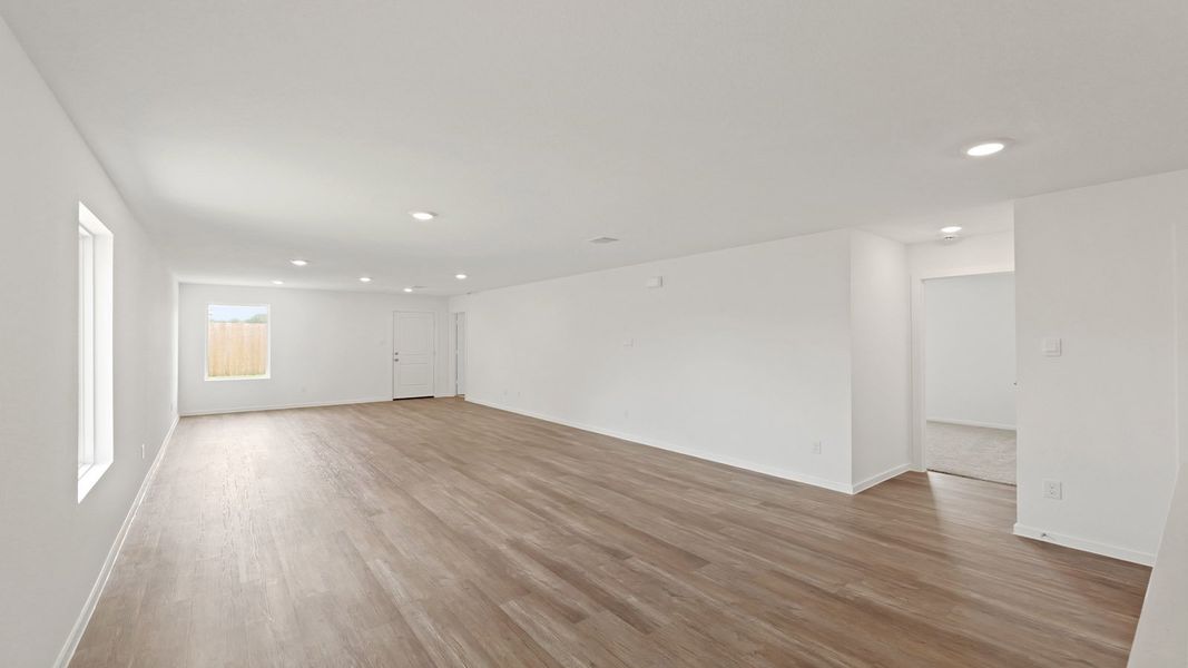 Representative unfurnished interior of a home built from the Estero by D.R. Horton in Lake Conroe Cove, Willis (Image 16). Representative unfurnished interior of a home built from the Estero by D.R. Horton in Lake Conroe Cove, Willis (Image 16).