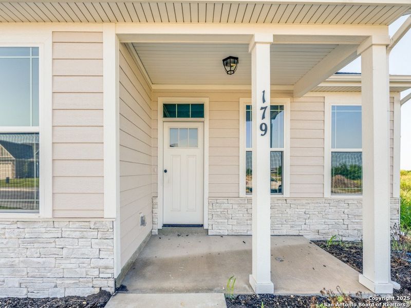 Front exterior of a new home in Marion Park, Marion, TX, highlighting curb appeal (Image 15).