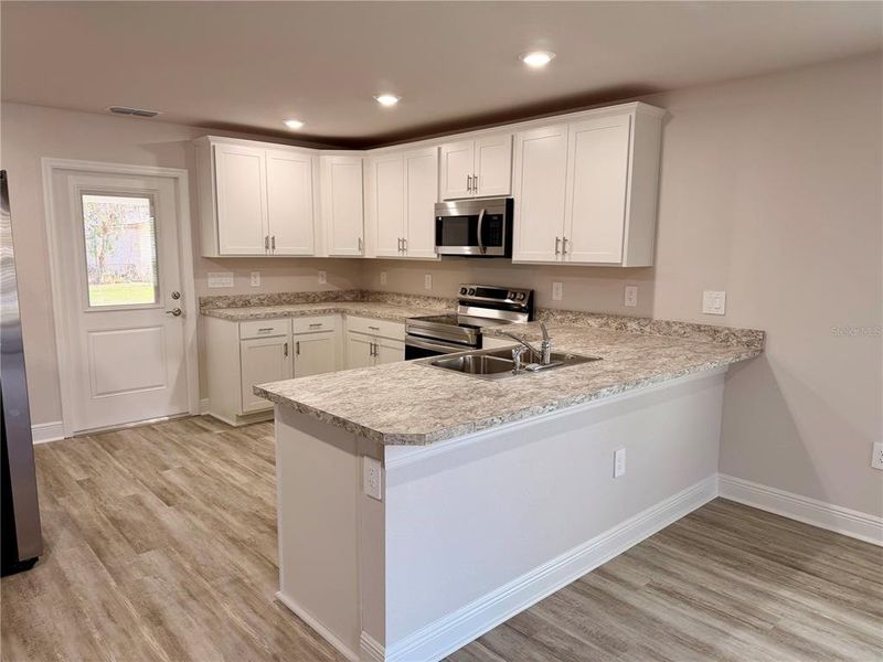 Furnished interior view inside a new home in , Lake Wales (Image 7).