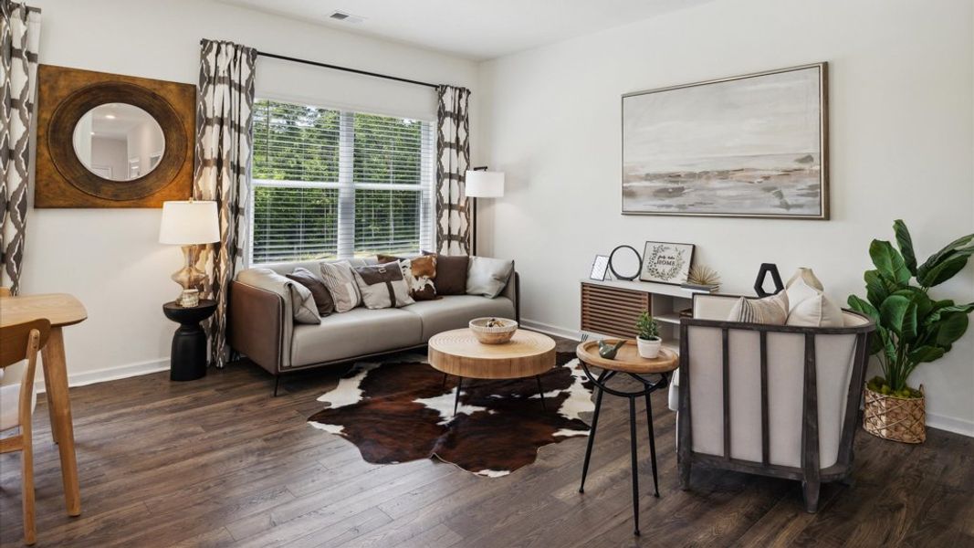 Representative furnished interior of a home built from the Altamont Townhome by D.R. Horton in Saint Marc's, Powell (Image 8).