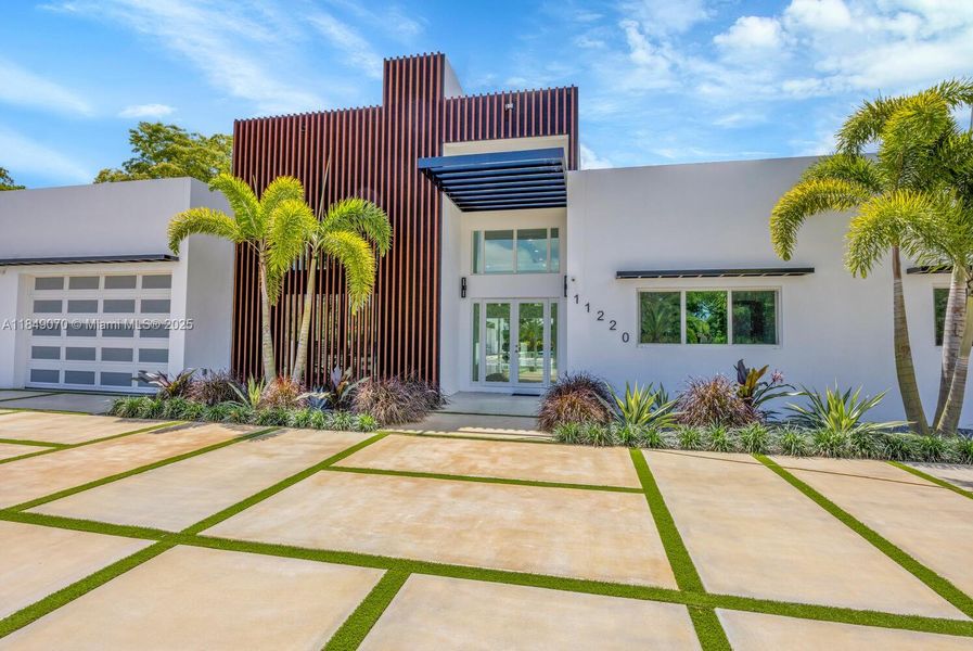 Front exterior of a new home in , Miami, FL, highlighting curb appeal (Image 24).
