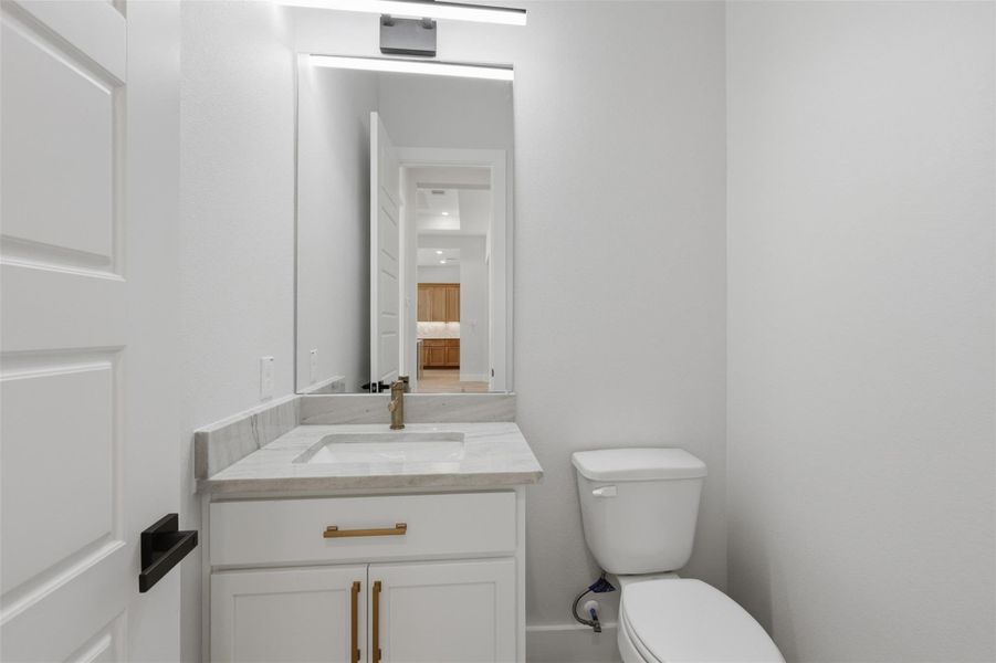 Your guest bathroom separates the bonus room from your primary bedroom!