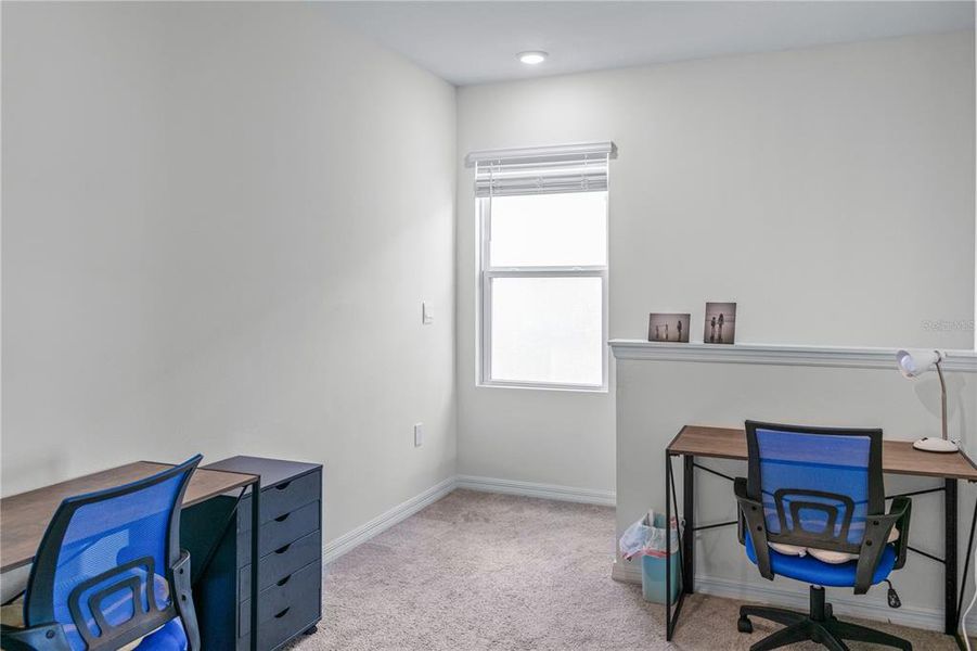 Furnished interior view inside a new home in Eagle Hammock, Eagle Lake (Image 9).