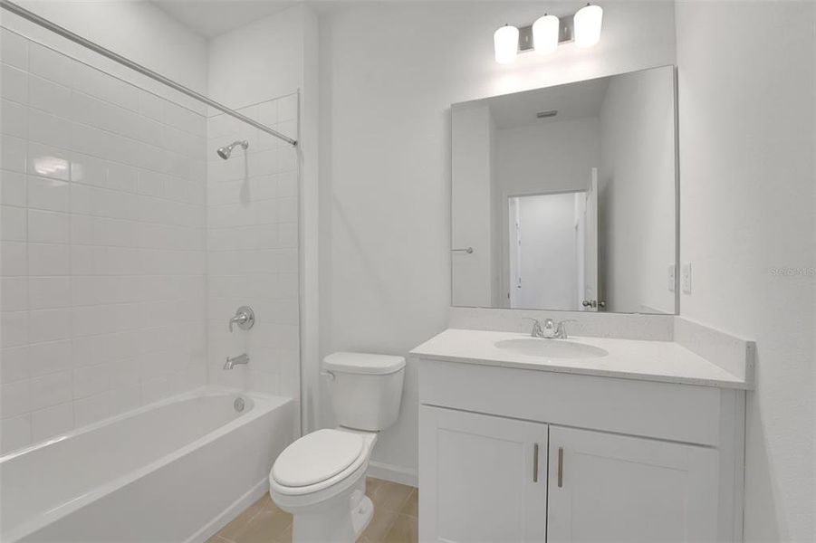 Furnished interior view inside a new home in Willowbrook North, Winter Haven (Image 4). Furnished interior view inside a new home in Willowbrook North, Winter Haven (Image 4).