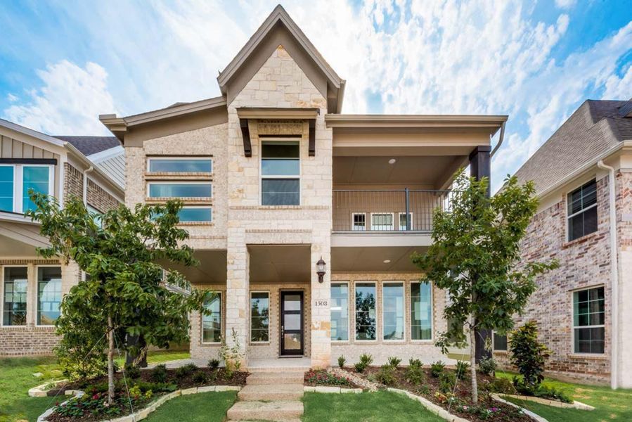 Representative exterior photo of a completed home built from the Royal Bradford by Grand Homes in Trails at Cottonwood Creek, Rowlett, TX (Image 18). Representative exterior photo of a completed home built from the Royal Bradford by Grand Homes in Trails at Cottonwood Creek, Rowlett, TX (Image 18).