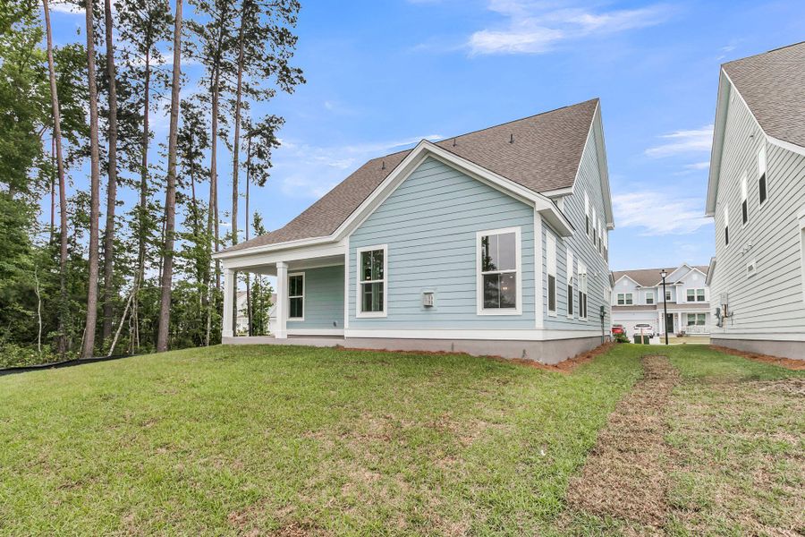 Exterior details and patio area of a home in Tidewater at Lakes of Cane Bay, Summerville (Image 22). Exterior details and patio area of a home in Tidewater at Lakes of Cane Bay, Summerville (Image 22).