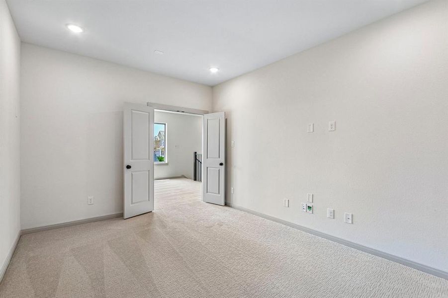 The spacious media room with adjacent game room creates the ultimate family fun zone!