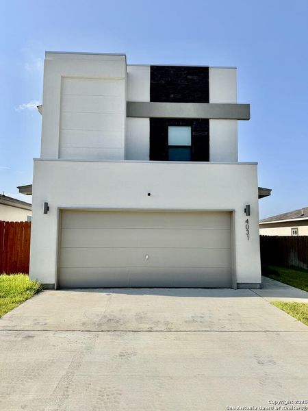 Front exterior of a new home in , Laredo, TX, highlighting curb appeal (Image 2). Front exterior of a new home in , Laredo, TX, highlighting curb appeal (Image 2).