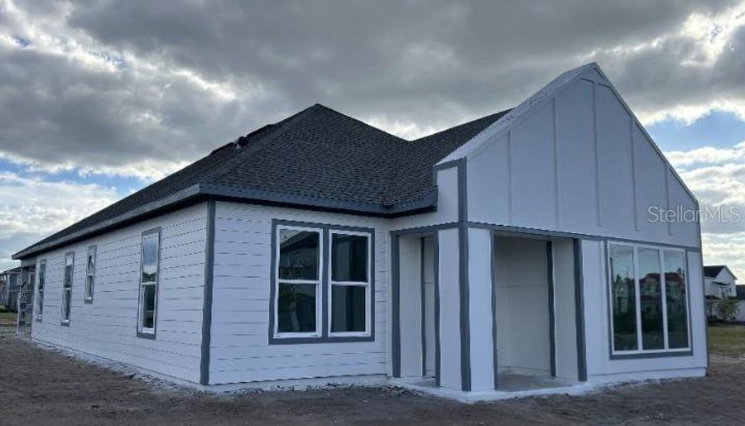Exterior details and patio area of a home in Weslyn Park Single Family, St. Cloud (Image 2).