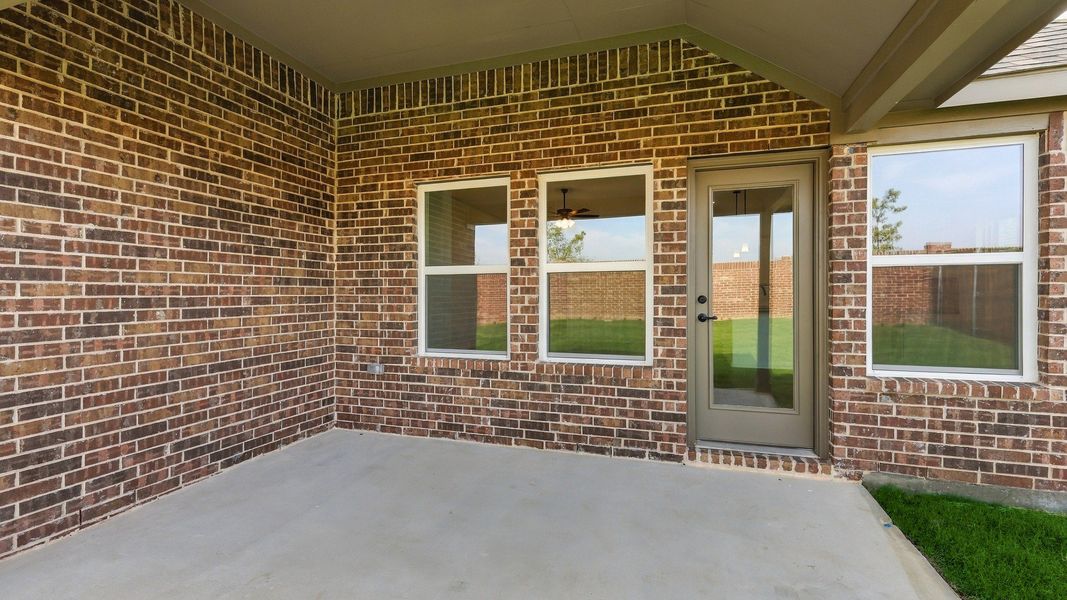 Exterior details and patio area of a home in Wildflower Ranch, Justin (Image 20). Exterior details and patio area of a home in Wildflower Ranch, Justin (Image 20).