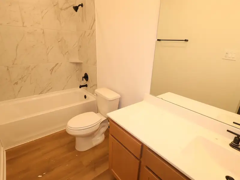 Furnished interior view inside a new home in Sorella, Tomball (Image 9).