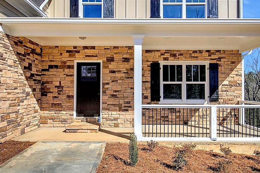 Front exterior of a new home in , Cartersville, GA, highlighting curb appeal (Image 1). Front exterior of a new home in , Cartersville, GA, highlighting curb appeal (Image 1).