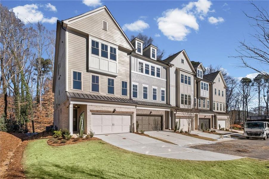 Front exterior of a new home in Devin's Shire - A Kennesaw Tradition, Kennesaw, GA, highlighting curb appeal (Image 20). Front exterior of a new home in Devin's Shire - A Kennesaw Tradition, Kennesaw, GA, highlighting curb appeal (Image 20).