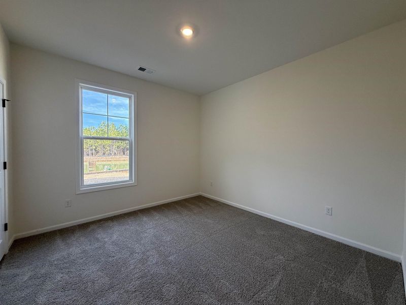Spacious, unfurnished interior of a new home in Westwood Reserve, Conway (Image 28).