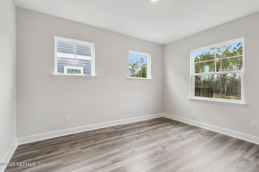 Spacious, unfurnished interior of a new home in Tributary 70', Yulee (Image 23).