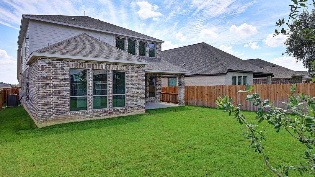 Exterior details and patio area of a home in Kallison Ranch, San Antonio (Image 27).