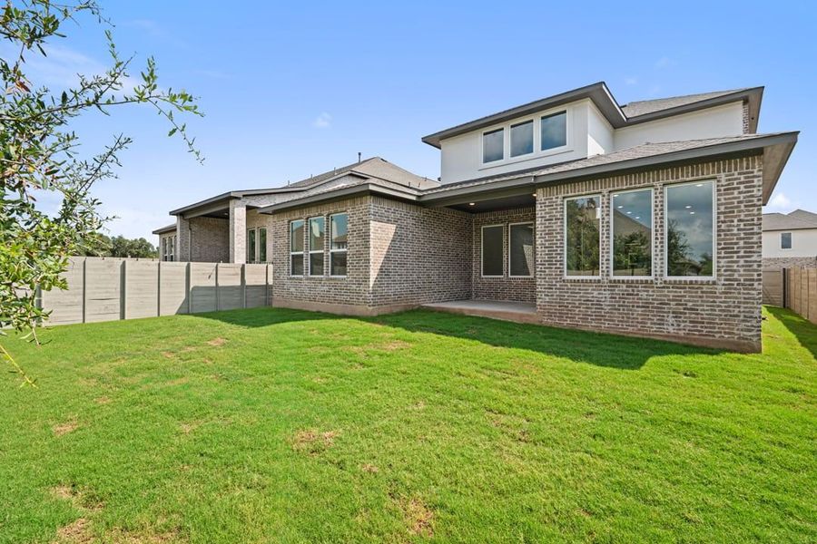Front exterior of a new home in Park Collection At Wolf Ranch, Georgetown, TX, highlighting curb appeal (Image 25). Front exterior of a new home in Park Collection At Wolf Ranch, Georgetown, TX, highlighting curb appeal (Image 25).