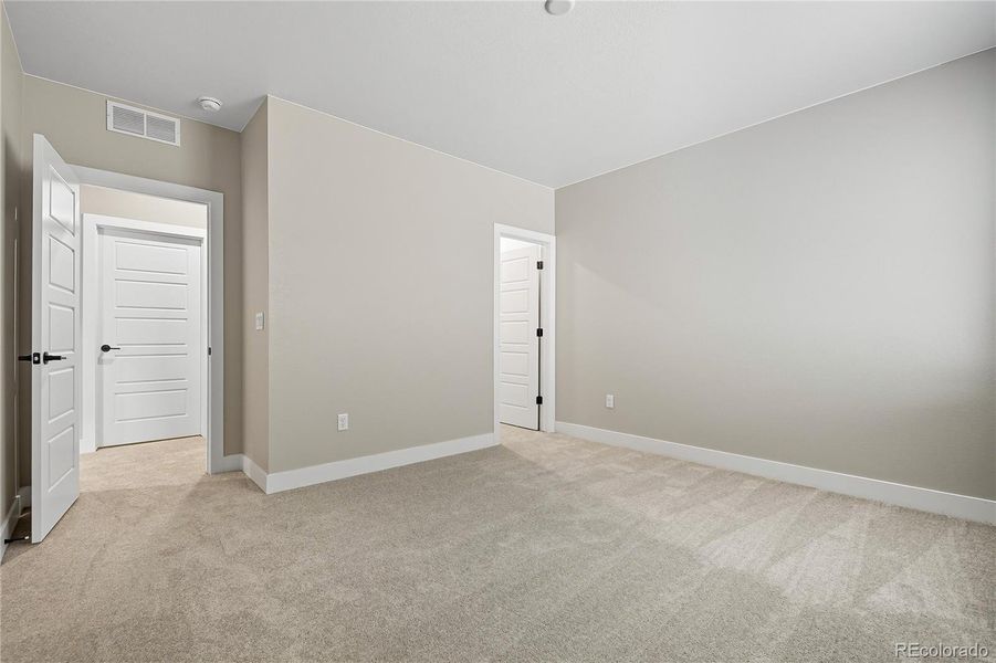 Additional Highlights Include: Finished full basement, bedroom and full bathroom at basement, modern fireplace and sliding glass door at gathering room, and standalone tub at primary bath.