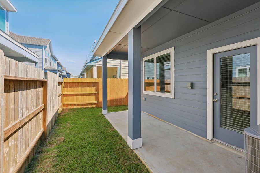 Exterior details and patio area of a home in Kemah Crossing - City Series, Kemah (Image 29). Exterior details and patio area of a home in Kemah Crossing - City Series, Kemah (Image 29).