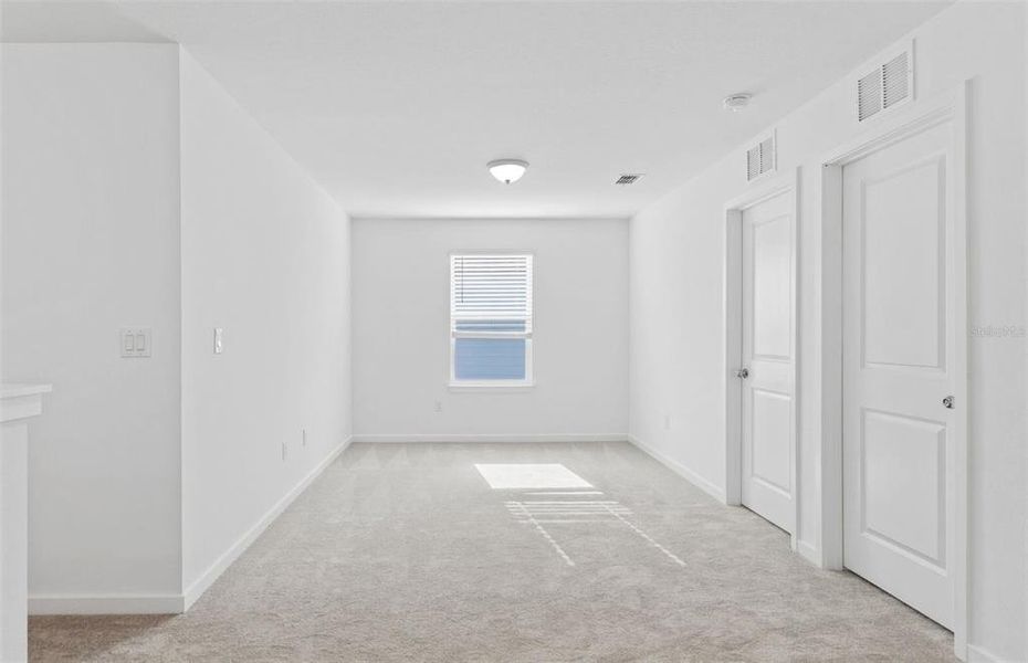 Spacious, unfurnished interior of a new home in Oakfield Lakes, Parrish (Image 13).
