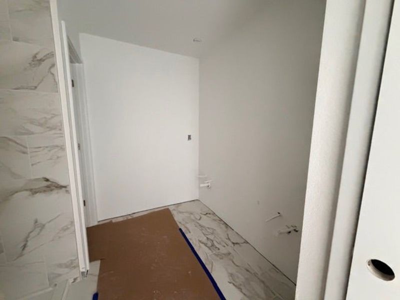 In-progress construction of a new home in Whaley Grove Townhomes, St. Cloud, FL (Image 15).