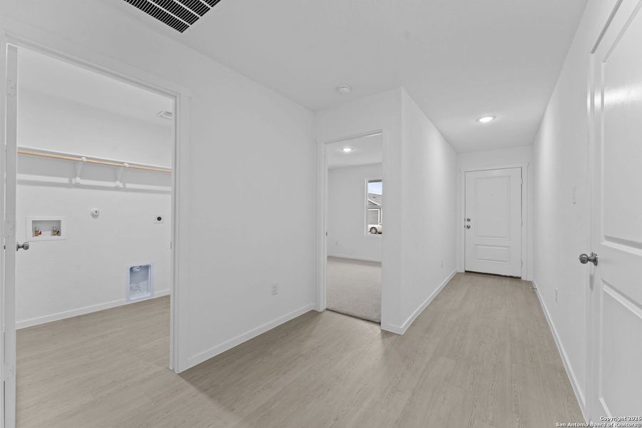 Spacious, unfurnished interior of a new home in Voss Farms: Watermill Collection, New Braunfels (Image 22).