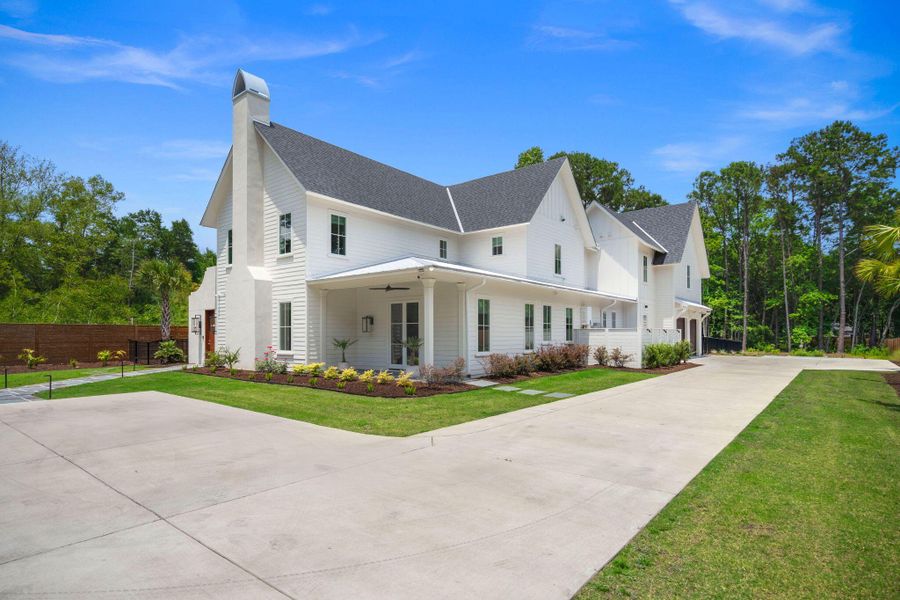 Front exterior of a new home in , Johns Island, SC, highlighting curb appeal (Image 30).