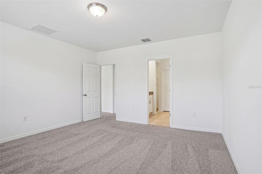 Spacious, unfurnished interior of a new home in Lake Deer Estates - Signature Series, Poinciana (Image 28). Spacious, unfurnished interior of a new home in Lake Deer Estates - Signature Series, Poinciana (Image 28).