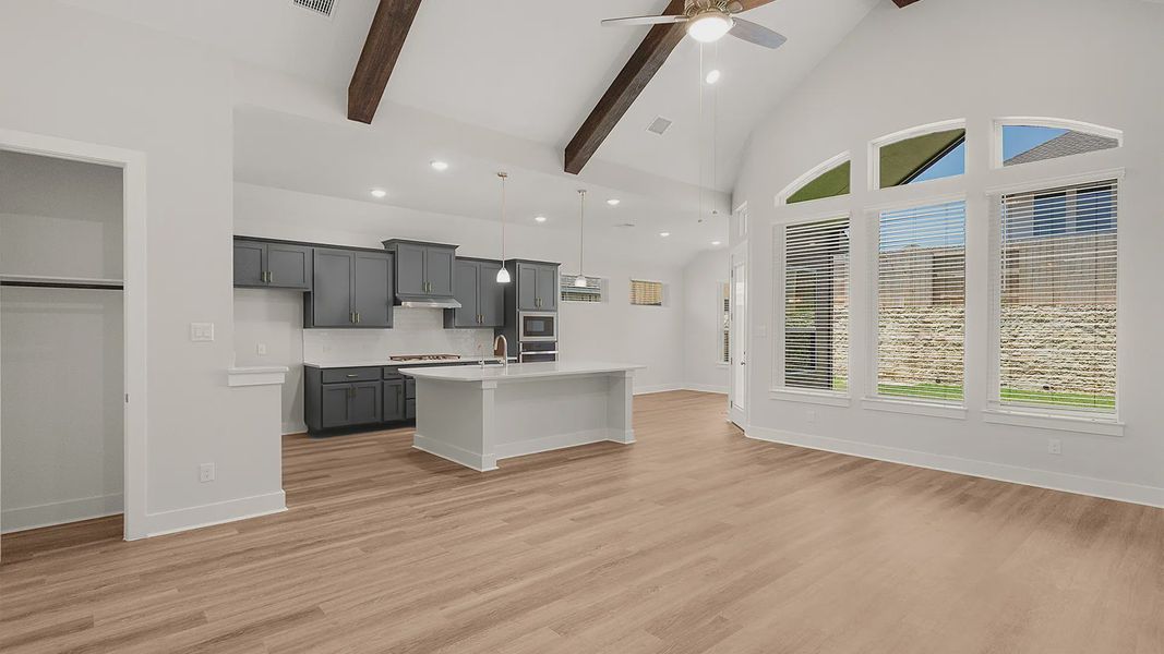 Representative furnished interior of a home built from the Brenner by Chesmar Homes in Newhaven, Manor (Image 7).