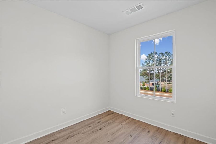 Spacious, unfurnished interior of a new home in The Village at River Green, Canton (Image 30).