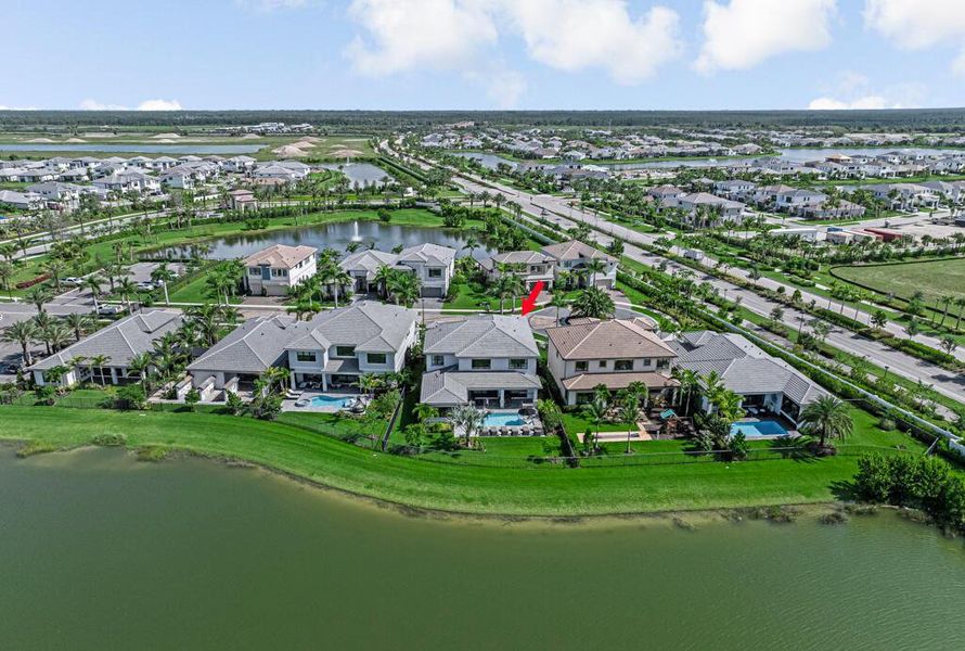 Front exterior of a new home in Apex at Avenir, Palm Beach Gardens, FL, highlighting curb appeal (Image 26).