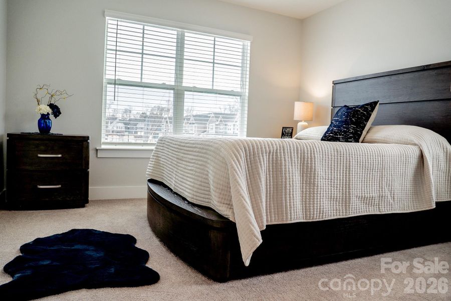 Bedroom #2 has a lot of natural light.