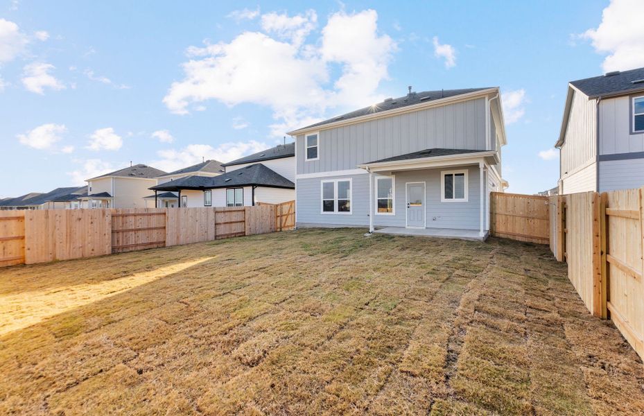 Exterior details and patio area of a home in Patterson Ranch, Georgetown (Image 25).
