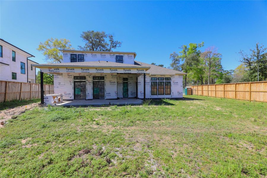 Covered Patio offers speaker pre-wire & outdoor kitchen w/ Coyote grill.