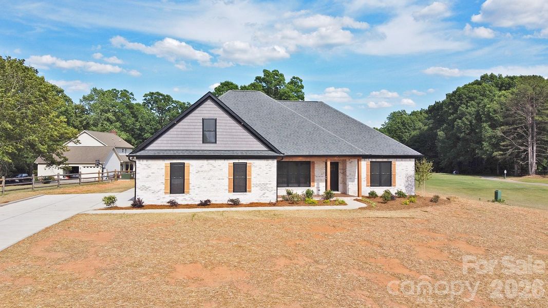 Front exterior of a new home in , China Grove, NC, highlighting curb appeal (Image 21).