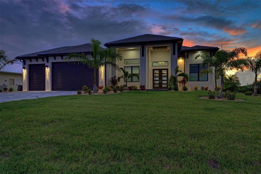 Front exterior of a new home in , Port Charlotte, FL, highlighting curb appeal (Image 24). Front exterior of a new home in , Port Charlotte, FL, highlighting curb appeal (Image 24).
