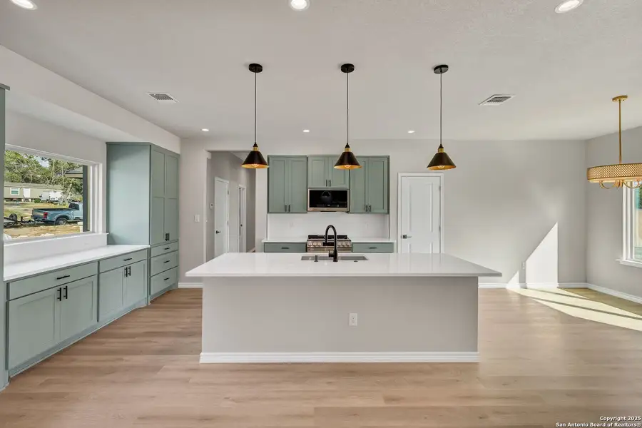 Furnished interior view inside a new home in , Elmendorf (Image 11).