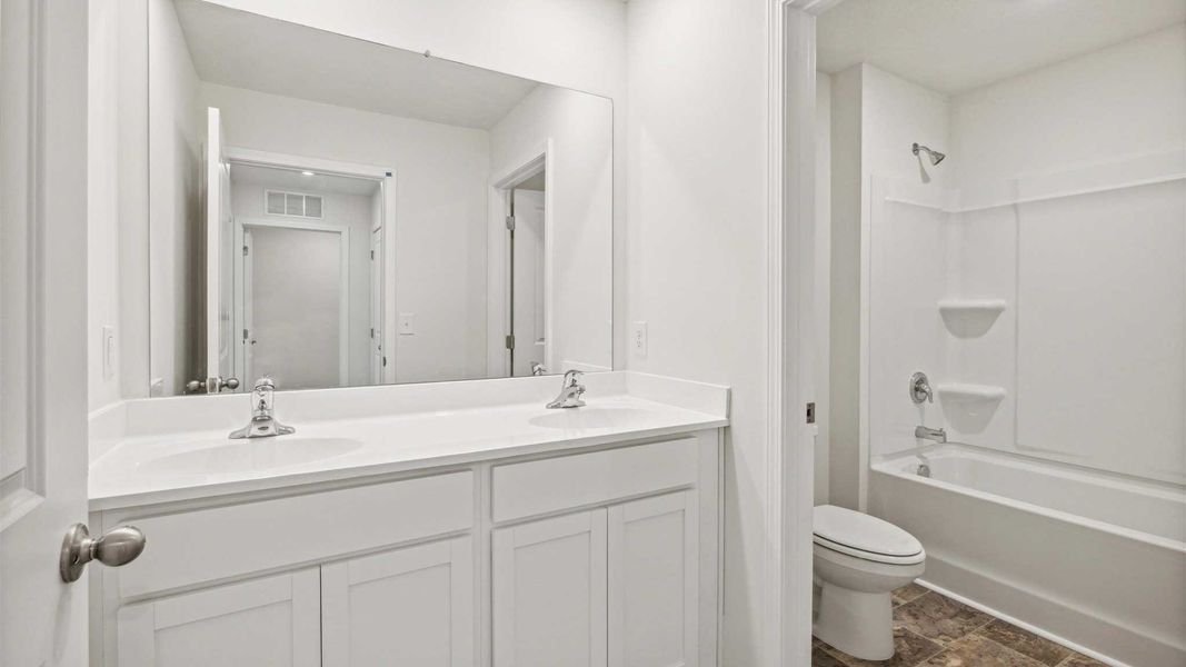 Representative furnished interior of a home built from the Edmon by D.R. Horton in Johnson Farms, Greeneville (Image 7).