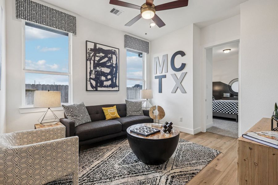 Representative furnished interior of a home built from the Orlando by Chesmar Homes in Wood Leaf Reserve, Tomball (Image 13).
