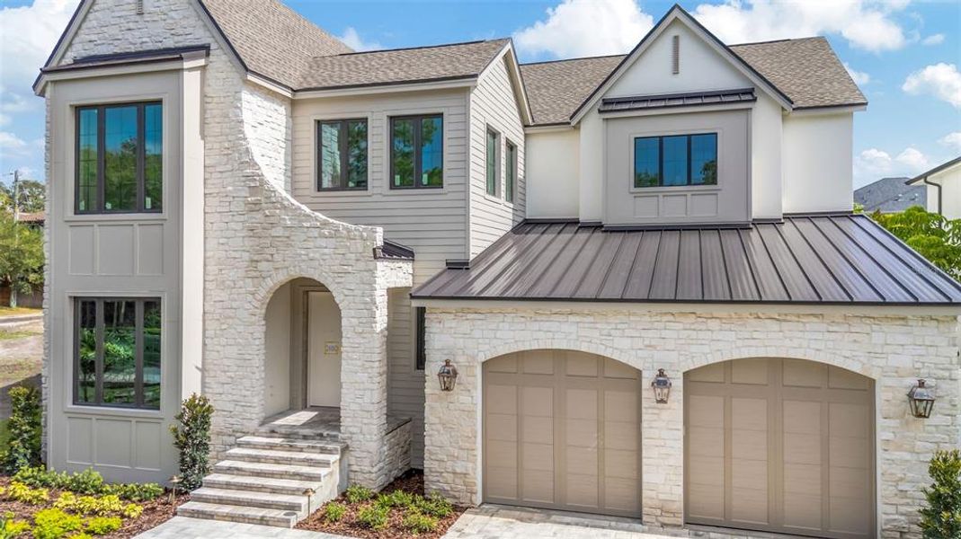 Front exterior of a new home in , Tampa, FL, highlighting curb appeal (Image 23). Front exterior of a new home in , Tampa, FL, highlighting curb appeal (Image 23).