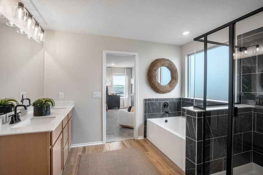 Representative furnished interior of a home built from the 2897 Modeled by KB Home in Stoney Chase, Del Valle (Image 9).